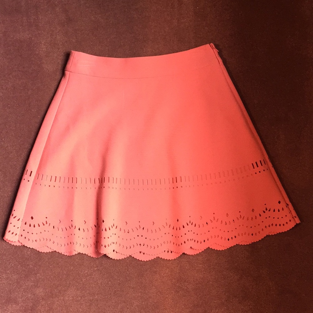 A flowy, coral pink Loft skirt